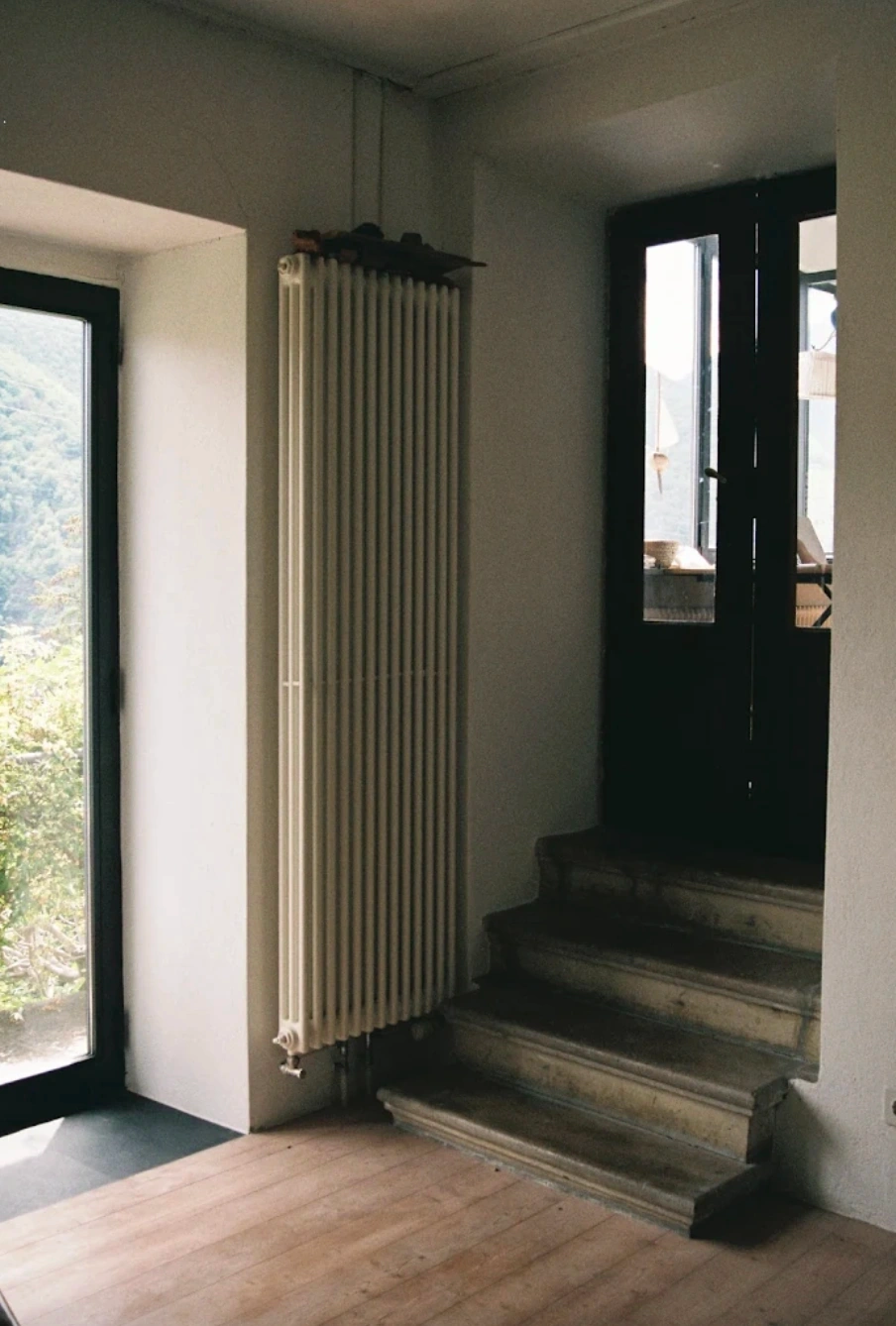 Tender Observer beside a doorway